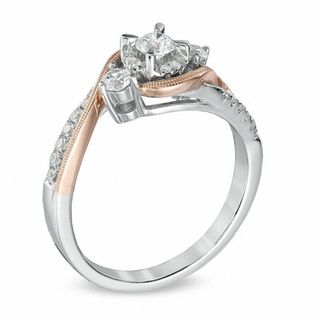 Previously Owned - 0.50 CT. T.W. Diamond Three Stone Swirl Engagement Ring in 10K Two-Tone Gold