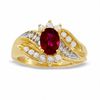 Thumbnail Image 0 of Previously Owned - Oval Lab-Created Ruby, White Sapphire and Diamond Accent Ring in 10K Gold