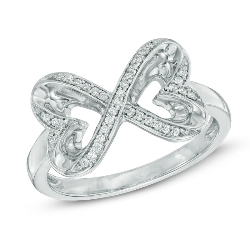 Previously Owned - The Heart Within® 0.10 CT. T.W. Diamond Heart-Shaped Infinity Ring in Sterling Silver