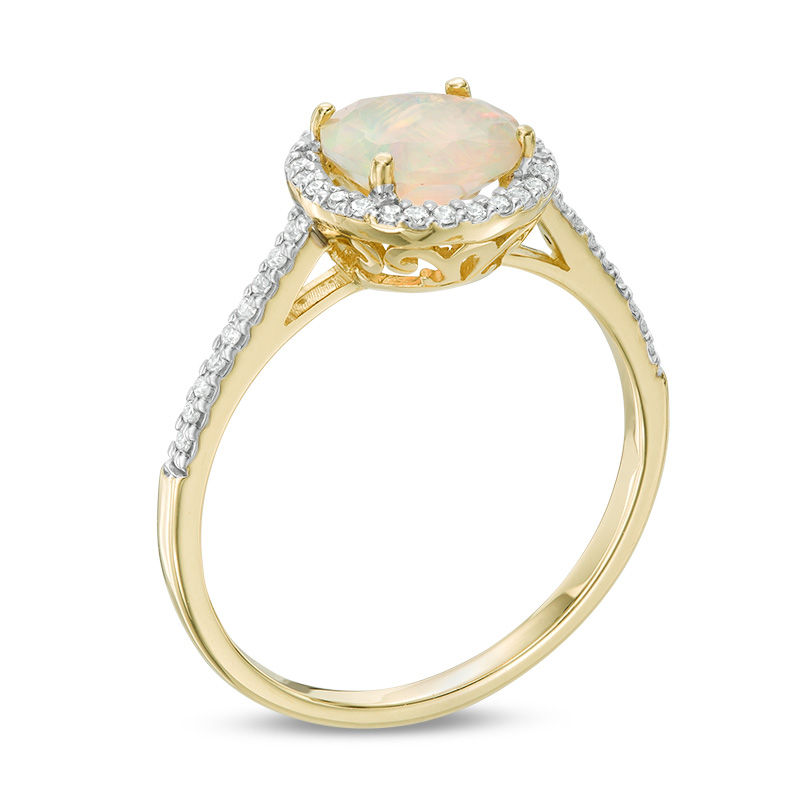 Previously Owned - 7.0mm Opal and 0.13 CT. T.W. Diamond Frame Ring in 10K Gold|Peoples Jewellers