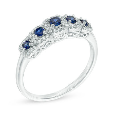 Previously Owned - Blue Sapphire and  0.15 CT. T.W. Diamond Ring in 10K White Gold