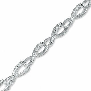 Previously Owned - 0.50 CT. T.W. Diamond Infinity Loop Bracelet in Sterling Silver