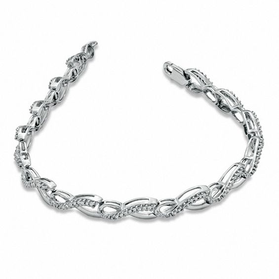 Previously Owned - 0.50 CT. T.W. Diamond Infinity Loop Bracelet in Sterling Silver