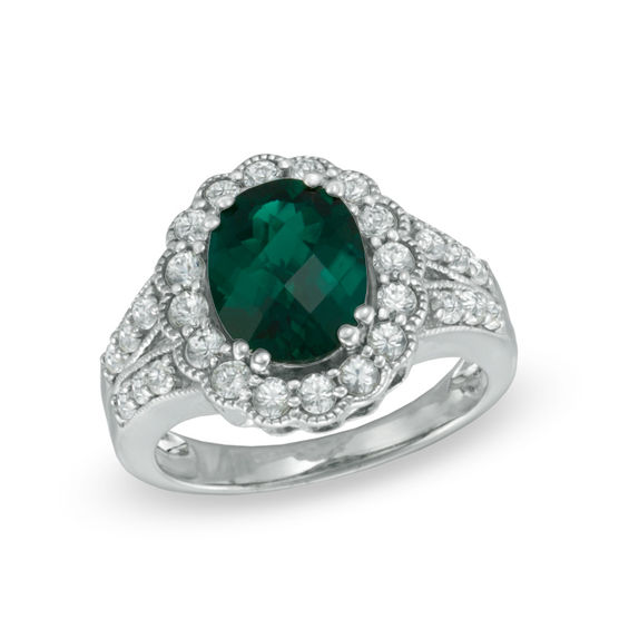 Previously Owned - Oval Lab-Created Emerald and White Sapphire Ring in Sterling Silver