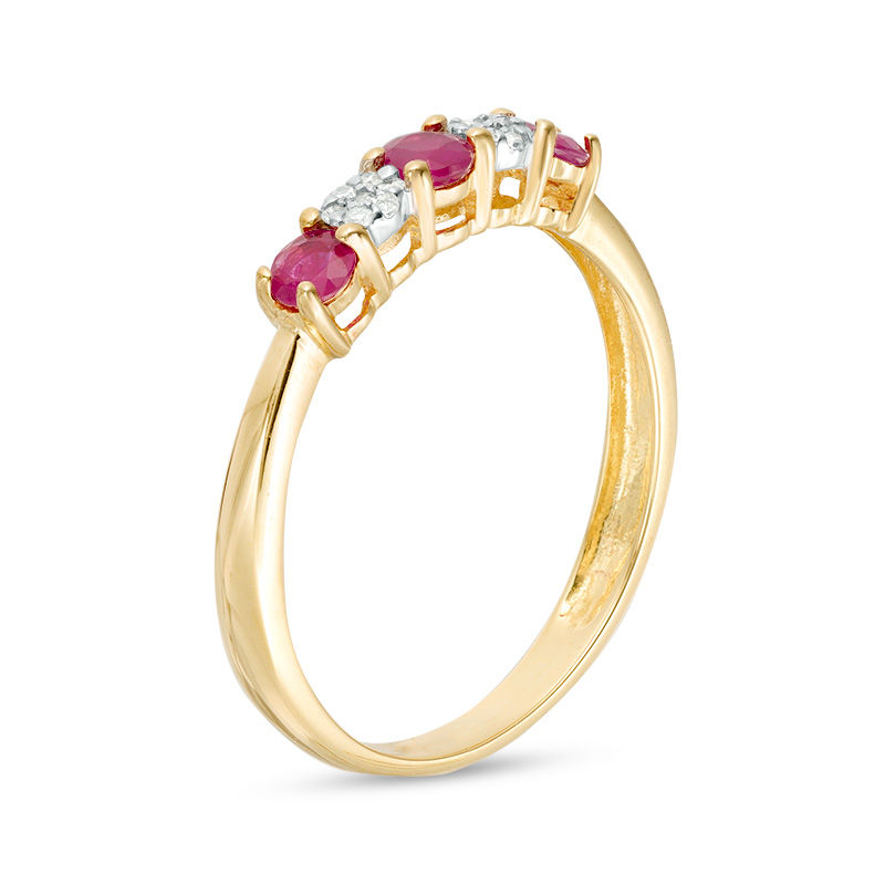 Previously Owned - Ruby and 0.04 CT. T.W. Composite Diamond Five Stone Ring in 10K Gold