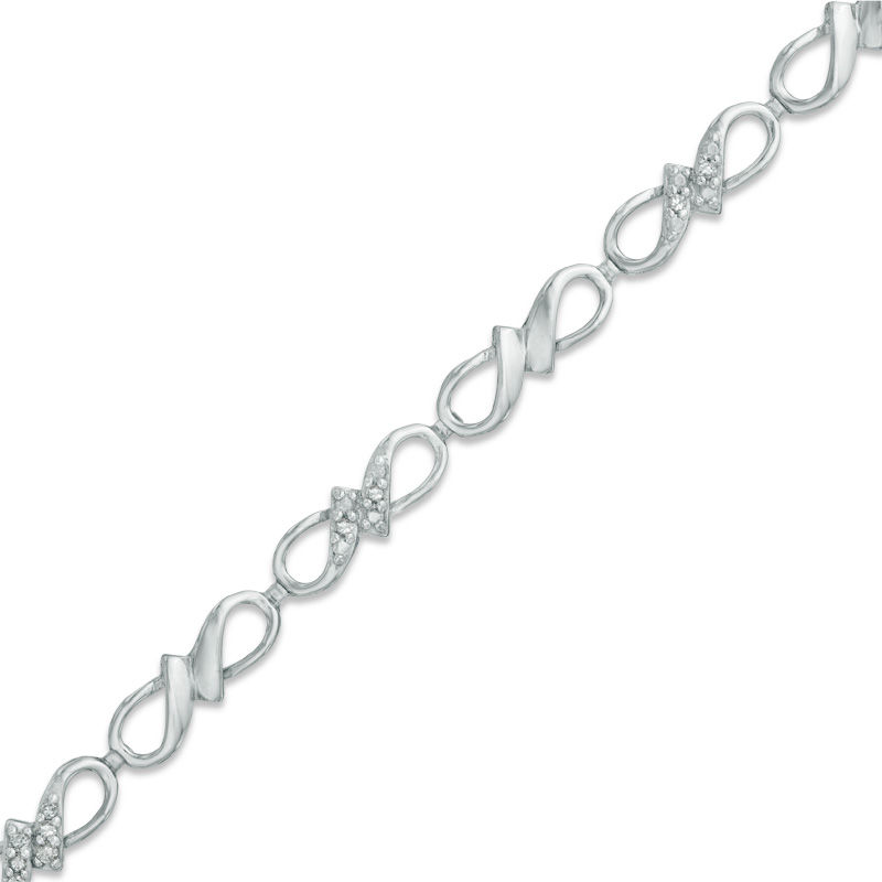 Previously Owned - 0.10 CT. T.W. Diamond Infinity Ribbon Link Bracelet in Sterling Silver - 7.25"