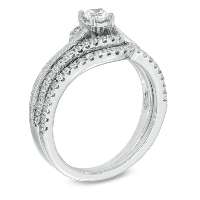 Previously Owned - 0.50 CT. T.W. Diamond Frame Swirl Bridal Set in 10K White Gold|Peoples Jewellers