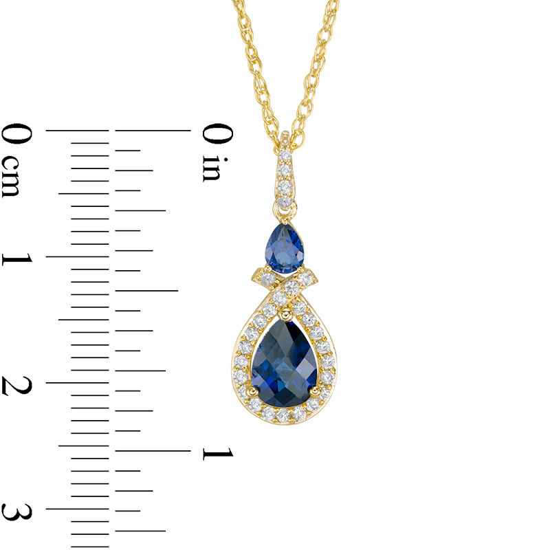 Previously Owned - Pear-Shaped Lab-Created Blue and White Sapphire Frame Pendant and Ring Set in 10K Gold
