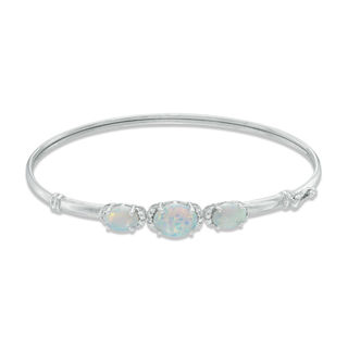 Previously Owned - Oval Lab-Created Opal and White Sapphire Three Stone Bangle in Sterling Silver