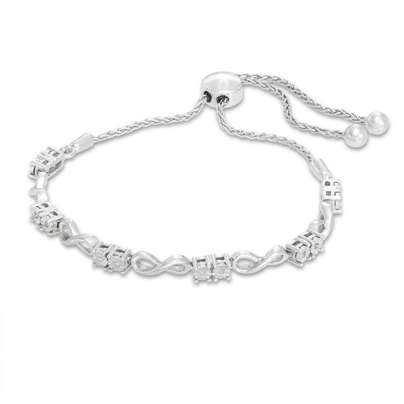 Previously Owned - 0.05 CT. T.W. Diamond Two-Stone Infinity Bolo Bracelet in Sterling Silver - 9.5"