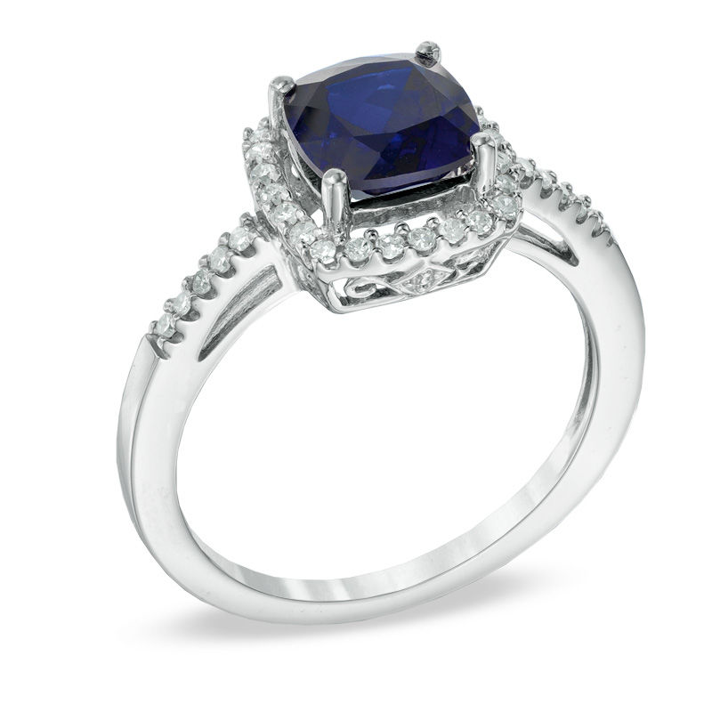 Previously Owned - 7.0mm Cushion-Cut Lab-Created Blue Sapphire and 0.15 CT. T.W. Diamond Frame Ring in 10K White Gold