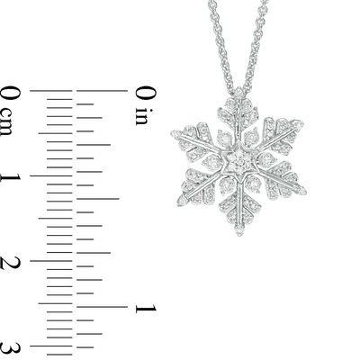 Previously Owned - 0.04 CT. T.W. Diamond Snowflake Pendant in Sterling Silver