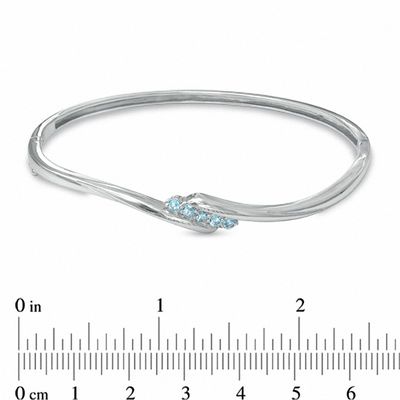 Previously Owned - Blue Topaz Bypass Bangle in Sterling Silver