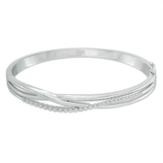 Previously Owned - 0.15 CT. T.W. Diamond Layered Crossover Bangle in Sterling Silver