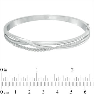 Previously Owned - 0.15 CT. T.W. Diamond Layered Crossover Bangle in Sterling Silver