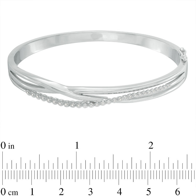 Previously Owned - 0.15 CT. T.W. Diamond Layered Crossover Bangle in Sterling Silver