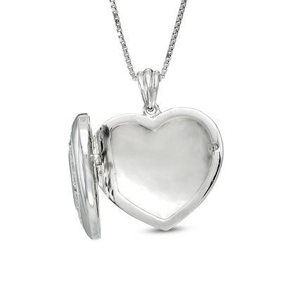 Previously Owned - Unstoppable Love™  0.05 CT. T.W. Diamond Triple Heart Locket in Sterling Silver