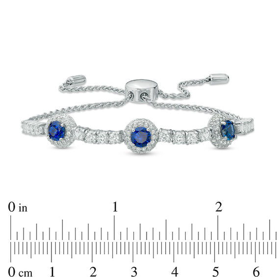 Previously Owned - 5.0mm Lab-Created Blue and White Sapphire Frame Three Stone Bolo Bracelet in Sterling Silver - 9.0"