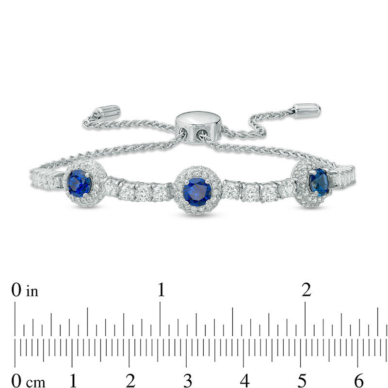Previously Owned - 5.0mm Lab-Created Blue and White Sapphire Frame Three Stone Bolo Bracelet in Sterling Silver - 9.0"