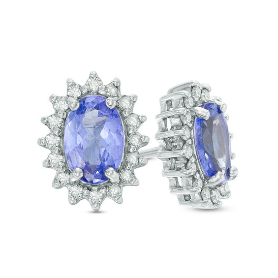 Previously Owned - Oval Tanzanite and 0.16 CT. T.W. Diamond Starburst Frame Stud Earrings in Sterling Silver