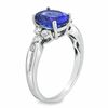 Thumbnail Image 1 of Previously Owned - Oval Tanzanite and 0.27 CT. T.W. Diamond Ring in 14K White Gold