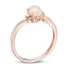 Thumbnail Image 1 of Previously Owned - Oval Opal and Diamond Accent Bypass Ring in 10K Rose Gold