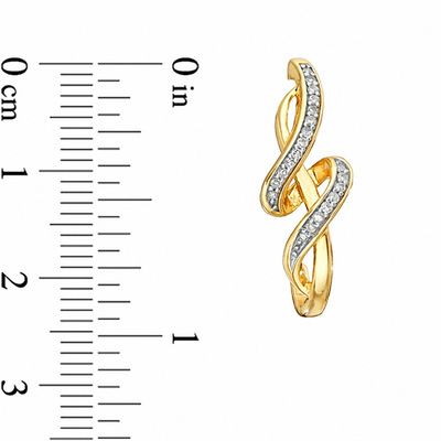 Previously Owned - 0.20 CT. T.W. Diamond Twisted Drop Earrings in 10K Gold