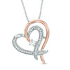 Thumbnail Image 0 of Previously Owned - 0.18 CT. T.W.   Diamond Heart Pendant in Sterling Silver and 10K Rose Gold (I/I2)