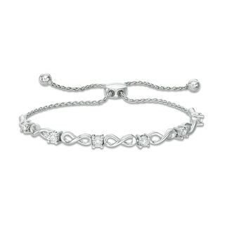 Previously Owned - 0.16 CT. T.W. Diamond Infinity Bolo Bracelet in 10K White Gold - 9.5"