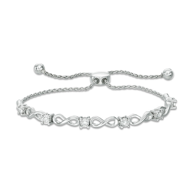 Previously Owned - 0.16 CT. T.W. Diamond Infinity Bolo Bracelet in 10K White Gold - 9.5"|Peoples Jewellers
