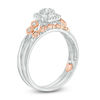 Thumbnail Image 1 of Previously Owned -  0.18 CT. T.W. Composite Diamond Frame Interlocking Bridal Set in 10K Two-Tone Gold