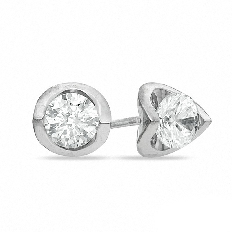 Previously Owned - 0.20 CT. T.W.  Diamond Tension-Set Earrings in 14K White Gold (I/I2)