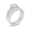 Previously Owned - Perfect Fit 0.30 CT. T.W. Diamond Frame Vine-Shank Interlocking Bridal Set in 10K White Gold