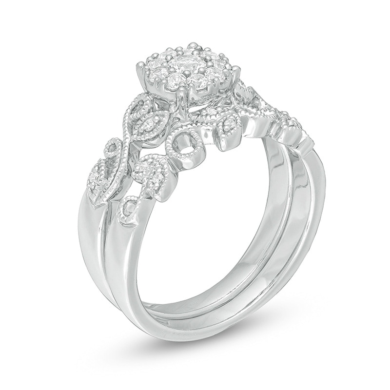 Previously Owned - Perfect Fit 0.30 CT. T.W. Diamond Frame Vine-Shank Interlocking Bridal Set in 10K White Gold|Peoples Jewellers