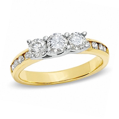 Previously Owned - 1.00 CT. T.W. Diamond Past Present Future® Three Stone Ring in 10K Gold