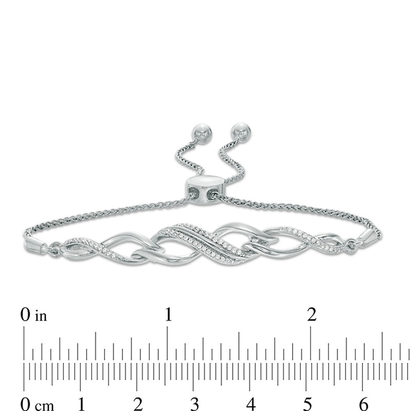 Previously Owned - 0.15 CT. T.W. Diamond Twist Bolo Bracelet in Sterling Silver - 9.5"|Peoples Jewellers