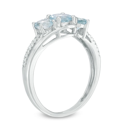 Previously Owned - Aquamarine and 0.04 CT. T.W. Diamond Three Stone Bypass Ring in 10K White Gold