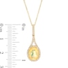 Thumbnail Image 1 of Previously Owned - Oval Multi-Colour Opal and 0.14 CT. T.W. Diamond Frame Drop Pendant in 10K Gold