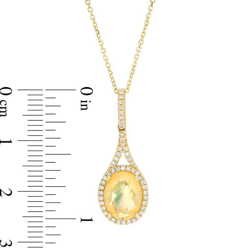 Previously Owned - Oval Multi-Colour Opal and 0.14 CT. T.W. Diamond Frame Drop Pendant in 10K Gold