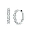 Previously Owned - 0.23 CT. T.W. Diamond Twist Hoop Earrings in 10K White Gold