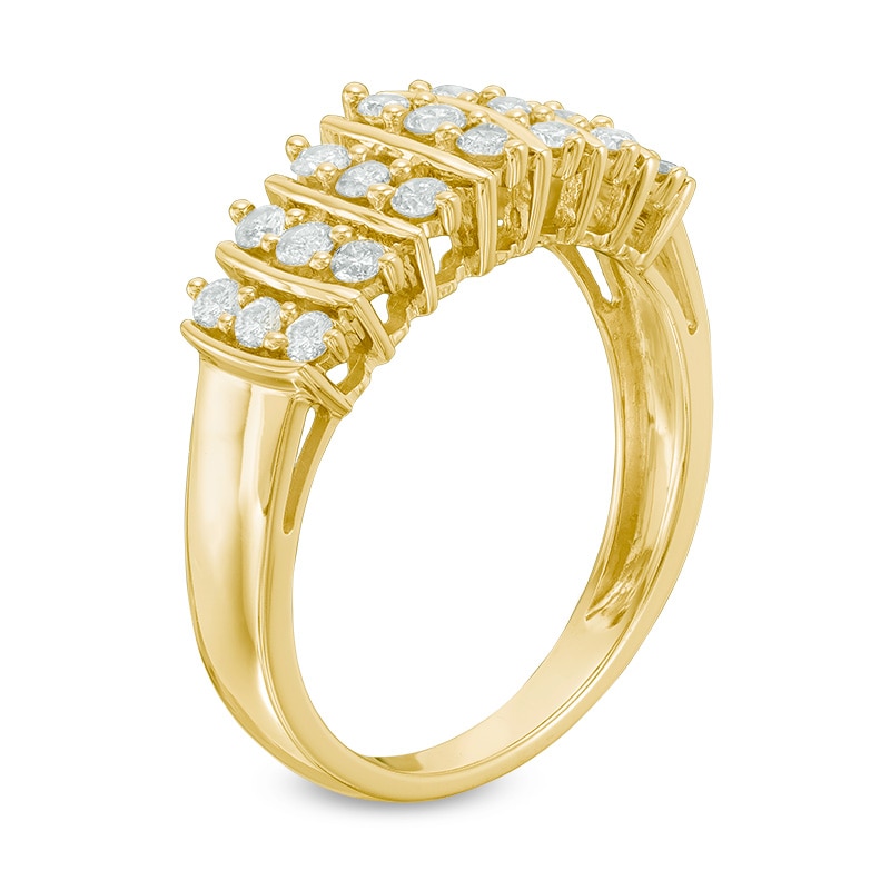 Previously Owned - 0.50 CT. T.W. Diamond Channel Band in 10K Gold