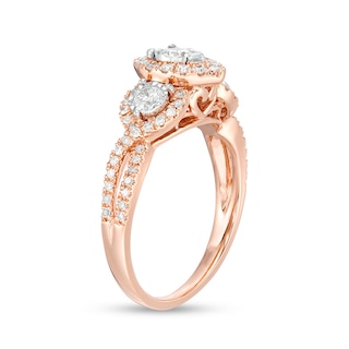 Previously Owned - 0.70 CT. T.W. Diamond Past Present Future® Pear-Shaped Frame Twist Engagement Ring in 10K Rose Gold