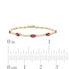 Previously Owned - Oval Garnet and Diamond Accent Bracelet in Sterling Silver with 10K Gold Plate - 7.25"