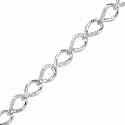 Previously Owned - 0.25 CT. T.W. Diamond Flame Link Bracelet in 10K White Gold