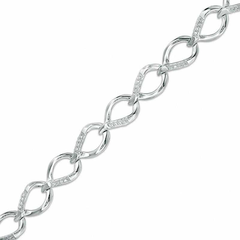 Previously Owned - 0.25 CT. T.W. Diamond Flame Link Bracelet in 10K White Gold|Peoples Jewellers