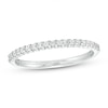 Previously Owned - 0.15 CT. T.W. Diamond Anniversary Band in 10K White Gold - Size 4