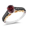 Previously Owned - Enchanted Disney Villains Evil Queen Oval Garnet and 0.23 CT. T.W. Diamond Ring