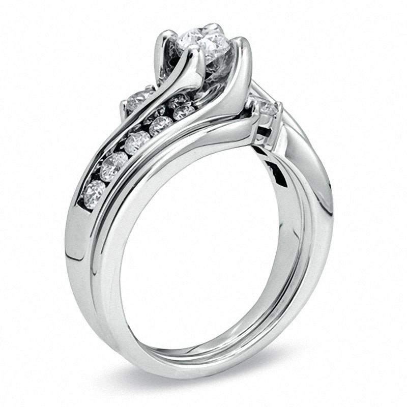 Previously Owned - 1.00 CT. T.W. Diamond Three Stone Bridal Set in 14K White Gold|Peoples Jewellers