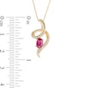 Previously Owned - Oval Ruby and Diamond Accent Looping Ribbon Pendant in 10K Gold