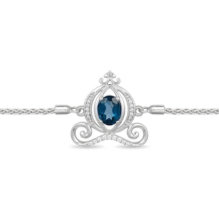 Previously Owned - Enchanted Disney Cinderella Oval Blue Topaz and 0.085 CT. T.W. Diamond Carriage Bolo Bracelet